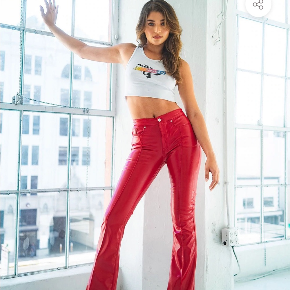 Red leather pants. Never worn. Size 24